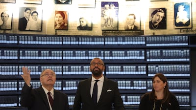 British Foreign Secretary James Cleverly (centre), chairman of Yad Vashem Dani Dayan (left) and Israeli Ambassador to the UK Tzipi Hotovely visit the Hall Of Names at Yad Vashem Holocaust Memorial museum in Jerusalem. EPA