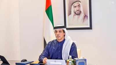Sheikh Mansour bin Zayed, Deputy Prime Minister and Minister of Presidential Affairs, attends a remote government meeting to discuss the UAE's post-coronavirus future. Courtesy: Dubai Media Office Twitter