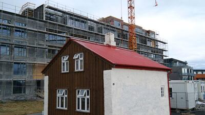 New buildings are constructed besides a traditional house in Reykjavik, Iceland. Matt Cardy / Getty Images