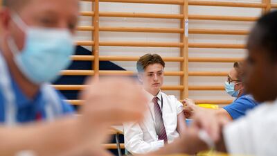 Pupils are immunised against Covid-19 at Belfairs Academy in Essex, England. Photo: PA