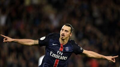 Paris Saint-Germain's Zlatan Ibrahimovic celebrates after scoring his second goal against Toulouse on Saturday in Ligue 1. Franck Fife / AFP / November 7, 2015