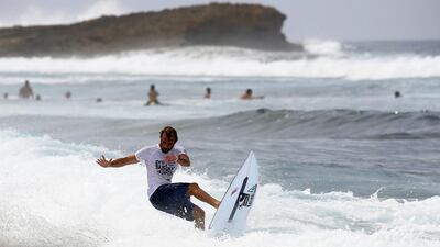 Puerto Rican surfer Gabriel Escudero in action during the 30th Corona Pro Surf Circuit at Middles beach in Isabela, Puerto Rico. Thais Llorca / EPA