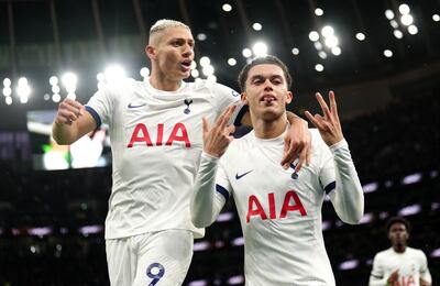 Tottenham Hotspur's Brennan Johnson, right, celebrates scoring a late winner against Brighton. PA