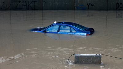 A car is stuck in a flooded tunnel in Beirut's southern suburb of Ouzai, Lebanon. AP Photo
