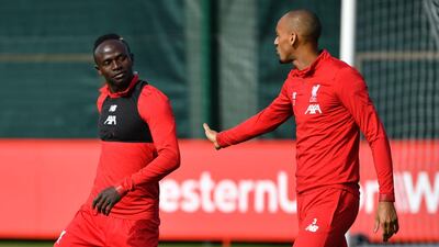 Liverpool's Senegalese striker Sadio Mane Brazilian midfielder Fabinho take part in a training session. AFP