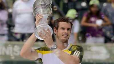 Andy Murray holds aloft the Sony Open trophy after his win over David Ferrer in Miami.