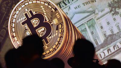 Bitcoin and other cryptocurrencies are not immune from the IRS. Roslan Rahman / AFP