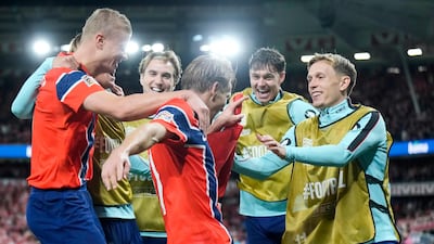 Norway's forward Erling Haaland, left, celebrates his winning goal against Denmark. AFP