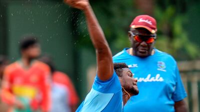 West Indies' Romario Shepherd bowls in Chennai. AFP