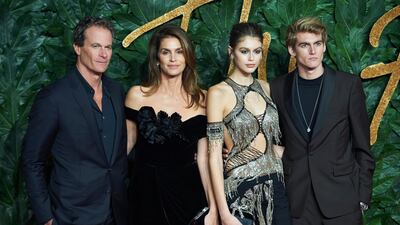 Kaia Gerber arrives at The Fashion Awards in London with her family. EPA