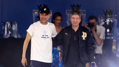 Pep Guardiola is interviewed on stage bu Oasis band member Noel Gallagher. Getty Images