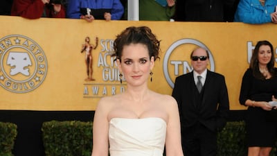 Winona Ryder wears an Alberta Ferretti bridal gown at the 17th Annual Screen Actors Guild Awards held at The Shrine Auditorium in Los Angeles, California, on January 30, 2011. Getty