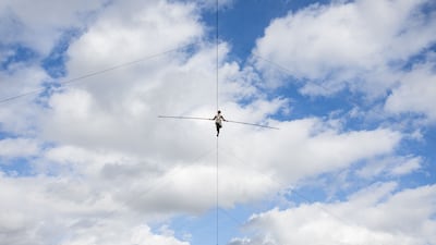 Tatiana Mosio-Bongonga walks along a 400-metre-long rope at a height ranging from 80 to 186 metres above ground, without a safety line, in Loos-en-Gohelle, France. AFP