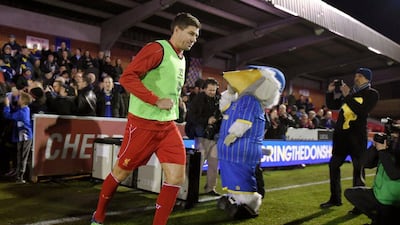Steven Gerrard of Liverpool runs out onto the pitch for the warm up prior to their FA Cup third round win over AFC Wimbledon on Monday. Michael Regan / Getty Images / January 5, 2015