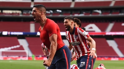 Luis Suarez celebrates after scoring Atletico Madrid's winning goal against Osasuna at Wanda Metropolitano. Getty Images