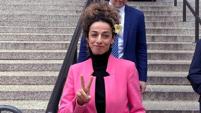Masih Alinejad leaves federal court in New York after giving a victim impact statement at the sentencing of Niloufar Bahadorifar. AP