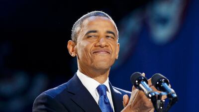 U.S. President Barack Obama smiles during his election night victory speech in Chicago, November 7, 2012. REUTERS/Kevin Lamarque (UNITED STATES - Tags: POLITICS ELECTIONS USA PRESIDENTIAL ELECTION) *** Local Caption *** CHI524_USA-CAMPAIGN_1107_11.JPG