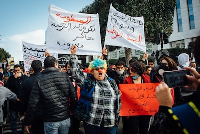 Activists protests against the failing government in April. As street protests continued, President Kais Saied further consolidated power around him by assuming control of both branches of the security forces. Erin Clare Brown for The National