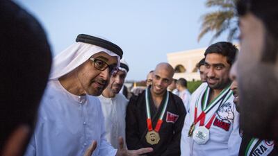 Sheikh Mohammed bin Zayed, Crown Prince of Abu Dhabi and Deputy Supreme Commander of the Armed Forces, speaks with winners of the winners of the Abu Dhabi World Professional Jiu-Jitsu Championship 2016, seen during a Sea Palace barza. Ryan Carter / Crown Prince Court - Abu Dhabi