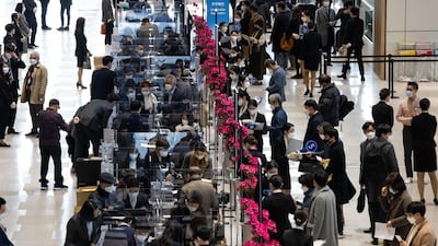 Event staff register attendees arriving for the Samsung Electronics Co. annual general meeting at the Suwon Convention Center in Suwon, South Korea. Bloomberg