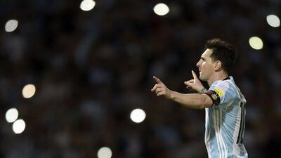 Argentina’s Lionel Messi celebrates after scoring against Bolivia during their Russia 2018 Fifa World Cup South American Qualifiers’ football match in Cordoba, Argentina, on March 29, 2016. AFP PHOTO / JUAN MABROMATA