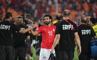 Egypt's Mohamed Salah celebrates after their opening win against Zimbabwe at Cairo International Stadium late on Friday. Gavin Barker / EPA