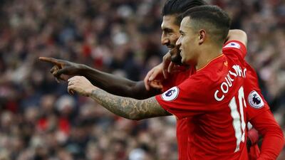 Liverpool's Emre Can celebrates scoring their third goal against Watford with Philippe Coutinho. Jason Cairnduff / Reuters