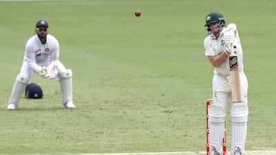 Australia's Steve Smith is caught behind off the bowling of Mohammed Siraj. AP