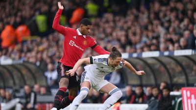 Luke Ayling of Leeds United is challenged by Marcus Rashford of Manchester United. Getty