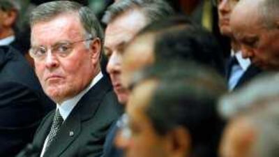 Former Bank of America Chairman and chief executive Officer Ken Lewis, left, and other top chief executive officers of banking institutions, testify on Capitol Hill in Washington before the House Financial Services Committee earlier this year, before Mr Lewis was ousted from his job last month.