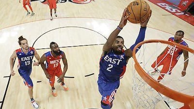 Eastern Conference All-Star Kyrie Irving, of the Cleveland Cavaliers, goes up for a dunk during the NBA All-Star Game on Sunday night. Eric Gay / AP Photo