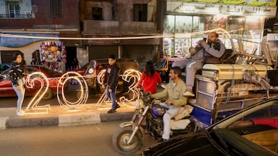 A 2023 decoration on a street in Cairo. Egypt's economy is expected to grow by 4.3 per cent over 2023-2024, driven by an increase in demand for and prices of gas. Photo: Reuters