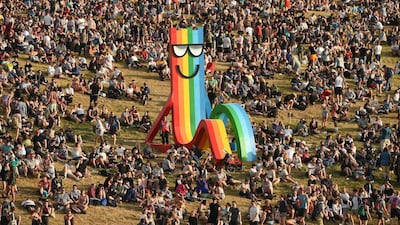 Revellers attend the Glastonbury Festival in Somerset. AFP