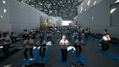 An International Day of Yoga celebration at Louvre Abu Dhabi. Ryan Lim for The National