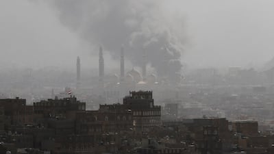 Smoke rises during the battle between former Yemeni president Ali Abdullah Saleh's supporters and the Houthi fighters in Sanaa, Yemen on December 2. Mohamed al-Sayaghi / Reuters