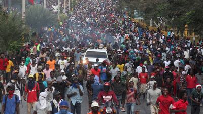 Demonstrators participate in an anti-government protest in Port-au-Prince. Reuters