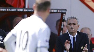 Manchester United manager Jose Mourinho applauds Wayne Rooney after scoring on Sunday. Frank Augstein / AP Photo / August 14, 2016