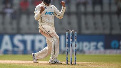 New Zealand's Ajaz Patel celebrates with his teammates after taking ten wickets against India in the second Test cricket at the Wankhede Stadium in Mumbai. AFP