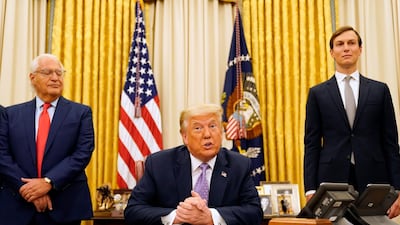 President Donald Trump speaks in the Oval Office at the White House, Thursday, Aug. 13, 2020. AP