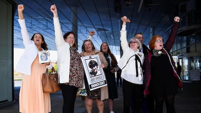 Family members celebrate after an inquest ruled the victims of the Ballymurphy shooting in 1971 were innocent. Reuters