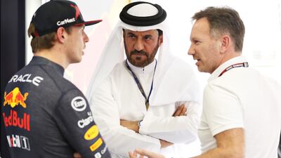 FIA president Mohammed ben Sulayem, centre, talks with Red Bull Racing team orincipal Christian Horner and F1 world champion Max Verstappen. Getty Images