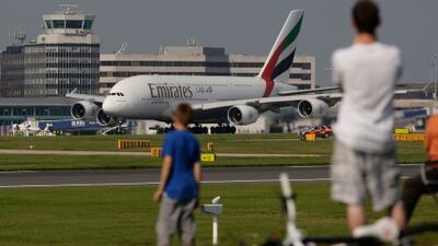 An Emirates flight at Manchester Airport. Typically planes carry defibrillators, inhalers and antihistamine injections on board. AP