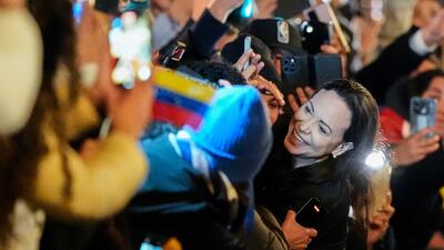 Nobel Peace Prize laureate Maria Corina Machado with the crowd gathered in front of the Grand Hotel, in Oslo, Norway. AP