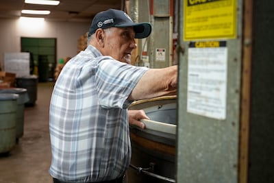 Bob Ajouz says he will vote for Donald Trump in the presidential election because of Joe Biden's handling of Israel's war against Hezbollah. Joshua Longmore / The National