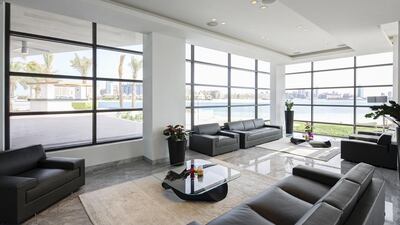 The new owner will be able to gaze across the water from the comfort of the sofa. Courtesy Knight Frank