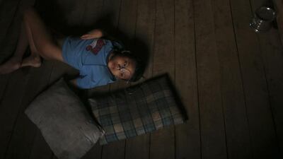 Tin Aung Zin, a nine-year-old Rohingya boy in a coma which his mother says was caused by shock during the communal violence in their former neighbourhood Nahzi village.