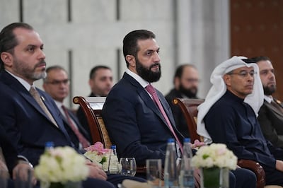 Syrian President Ahmad Al Shara with Dubai real estate tycoon Emaar founder Mohamed Alabbar in Damascus earlier this month. AFP