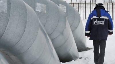 An employee inspects Gazprom pipelines in Sudzha, Russia. Ukraine is seeking to curb its dependence on Russian fuel. John Guillemin / Bloomberg News