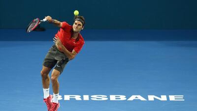 Roger Federer serves to Milos Raonic during the ATP Brisbane International final on Sunday in Australia. Dave Hunt / EPA