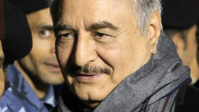 Field Marshal Khalifa Haftar, leader of the Libyan National Army of the parliament based in Tobruk, is greeted upon his return from Moscow at Al Kharouba airport, about 80km east of Benghazi, on December 3, 2016. Abdullah Doma / AFP